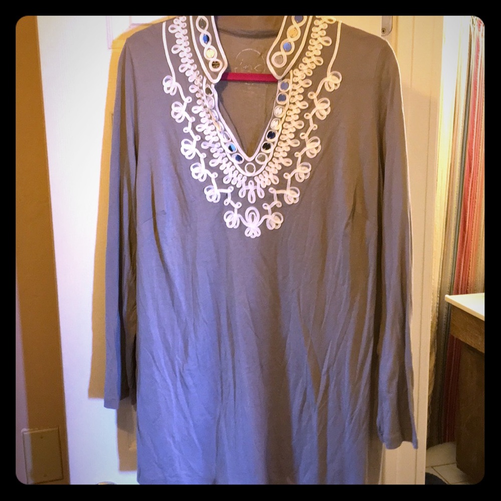 Beautiful top with detailed neckline.
